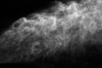 A stream of water and a cloud of drops