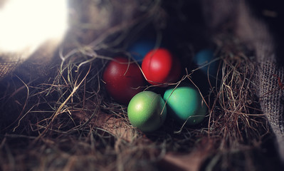 Easter painted eggs on burlap