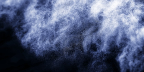 A stream of water and a cloud of drops