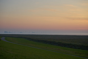 Naklejka na ściany i meble Sonnenuntergang in Nordfriesland Nordsee