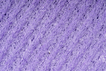Household cleaning sponges closeup. Sponge detail texture, sponge texture close up background. Cellulose sponge texture. Wire mesh on sponge surface background