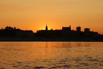 Panoramic city sunset from water 