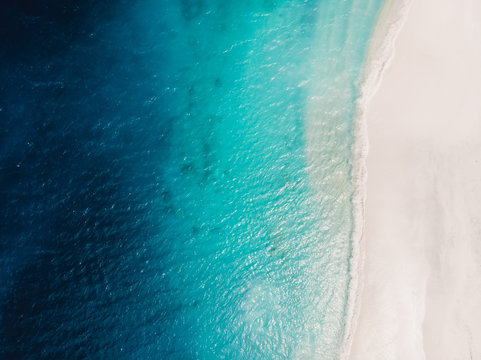 Beautiful tropical beach with turquoise crystal ocean, aerial view. Gili islands