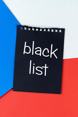 Black list Czech Republic. Mourning, ban, sanctions, politics. black sheet of notebook is on Czech...
