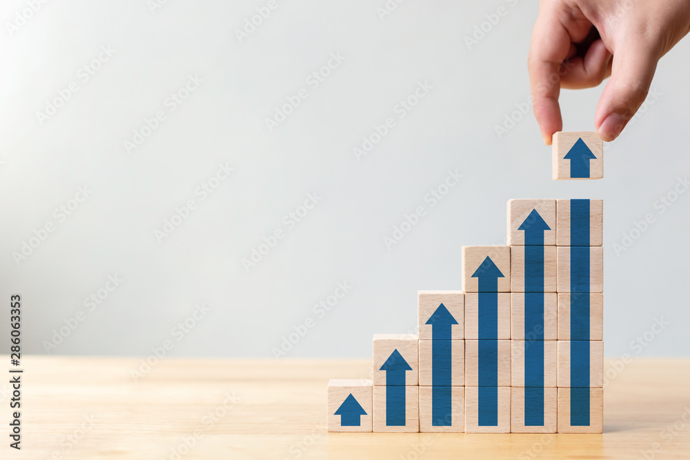 Wall mural ladder career path for business growth success process concept.hand arranging wood block stacking as