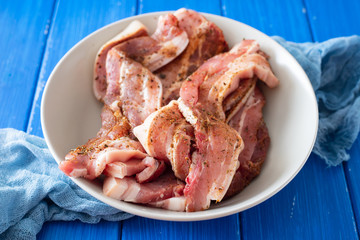 raw meat with herbs and garlic for grill on dish