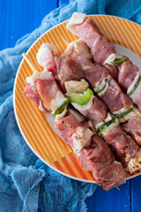 raw meat with herbs and garlic for grill on dish