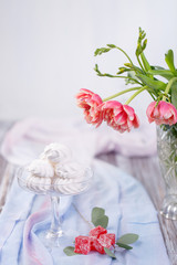 marshmallows in a glass stand and red marmalade