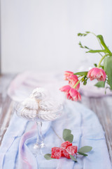 marshmallows in a glass stand and red marmalade