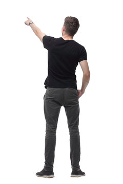 rear view. modern guy pointing at white blank screen