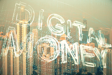 Double exposure of crypto currency theme hologram drawing and city veiw background. Concept of...