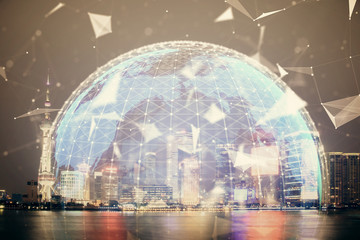 Double exposure of business theme hologram drawing and city veiw background. Concept of success.