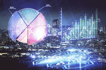 Financial graph on night city scape with tall buildings background double exposure. Analysis concept.