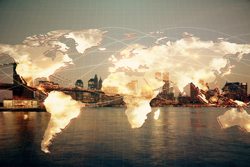 Double exposure of business theme hologram drawing and city veiw background. Concept of success.