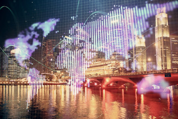 Double exposure of business theme hologram drawing and city veiw background. Concept of success.