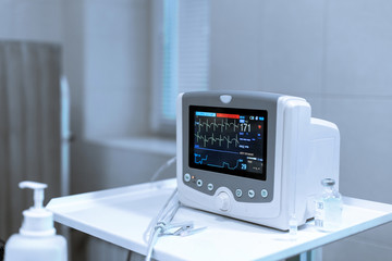 Heart rate monitor in hospital theater. Medical vital signs monitor instrument in a hospital on anesthesia surgery monitor. ECG Patient Monitor. medical electronics. Poor Vital Signs