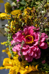 Floristic bouquet of flowers, herbs and fruits that are the symbol of summer