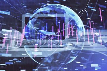 Double exposure of forex chart and work space with computer. Concept of international online trading.