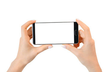 Smartphone with empty white screen in female hands isolated on white.