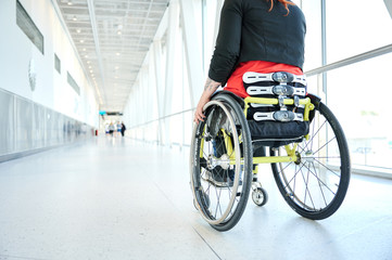 disabled woman in wheelchair bright environment