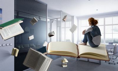 Little woman with large book concept