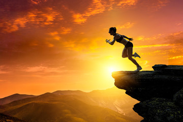 Jumping over precipice, challenge concept.