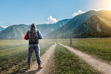 Travelling tourist with his backpack