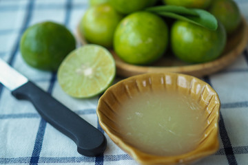 Fresh lime juice made in the glass