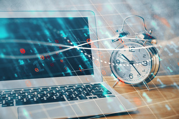 Financial chart drawing and table with computer on background. Multi exposure. Concept of...