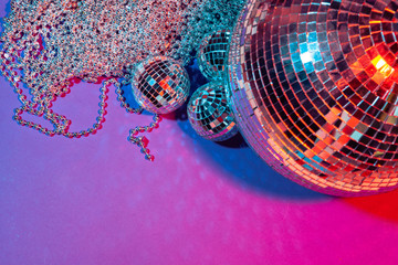 Mirror party balls put on table close up