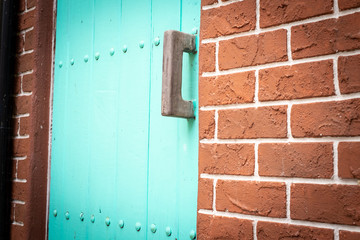 Old green wooden Italian door