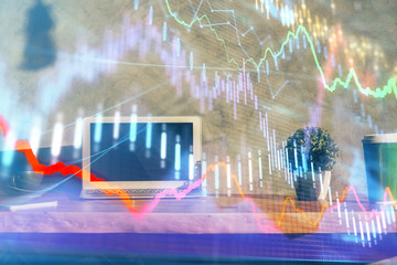 Multi exposure of chart and financial info and work space with computer background. Concept of international online trading.