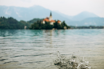 island prayer cathedral bled lake mountains background