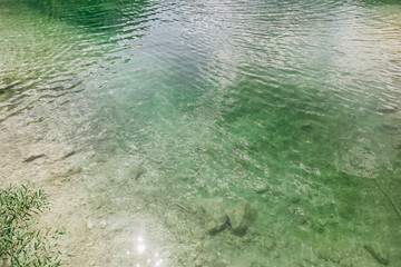 blue clear water mountain river stones bottom