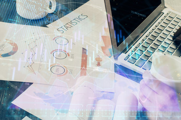 Double exposure of hands and notepad with business icons. Concept of international business.