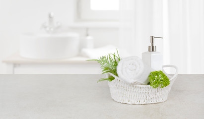 Purity concept with decorated bathroom accessories on stone table