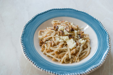 Turkish Homemade Food Noodle / Eriste with Cheese and Walnuts.