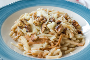 Turkish Homemade Food Noodle / Eriste with Cheese and Walnuts.