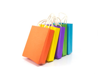 Colorful paper shopping bag isolated on white background.