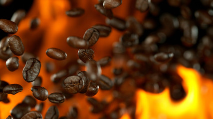 Fresh roasted coffee beans with flames