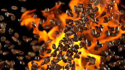 Fresh roasted coffee beans with flames
