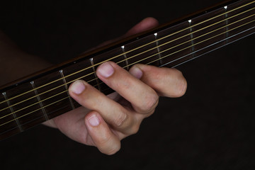 Acoustic Guitar Player Performing. Guitarist Playing In Music Studio