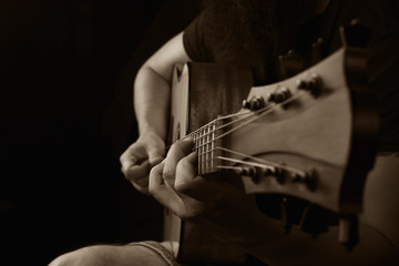 Acoustic Guitar Player Performing. Guitarist Playing In Music Studio