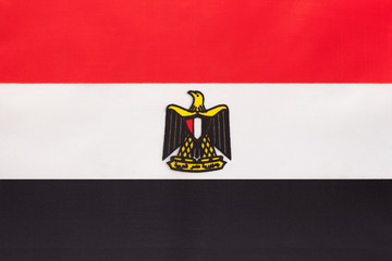 Egypt national fabric flag, textile background. Symbol of international african world country.