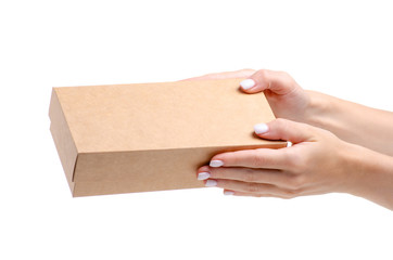 Brown box in hand on white background isolation