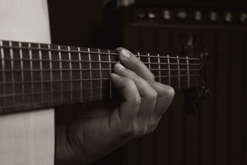 Acoustic Guitar Player Performing. Guitarist Playing In Music Studio