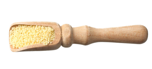 Couscous in wooden spoon isolated on white background. top view
