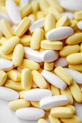 Fototapeta na wymiar Different pharmacology capsules pills heap