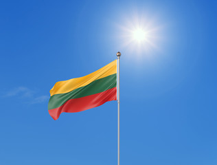 3D illustration. Colored waving flag of Lithuania on sunny blue sky background.