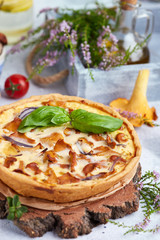 Quiche – open tart pie with chicken meat, forest mushrooms, onion and cheese 